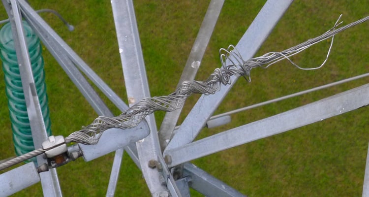 damaged earth wire on pylon